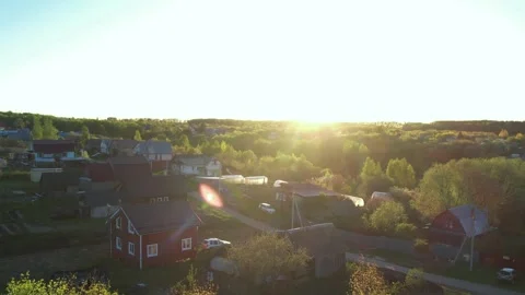Top view of green fields and forests. A bird flies over a lake in the forest.  Stock Footage 274206116