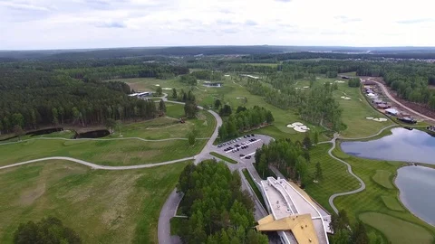Top view green golf course outdoor green grass field. Aerial view from flying Stock Footage