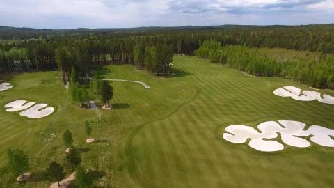 Top view green golf course outdoor green grass field. Aerial view from flying Foto stock