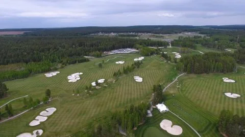 Top view green golf course outdoor green grass field. Aerial view from flying Stock-Fotos