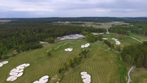 Top view green golf course outdoor green grass field. Aerial view from flying Stock-Fotos