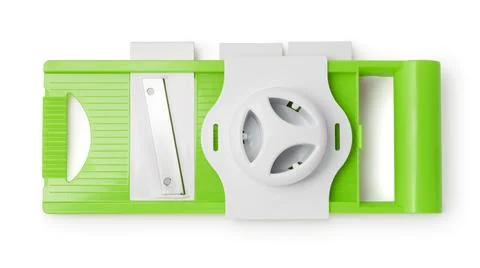 Top view of green plastic vegetable slicer Stock Photos