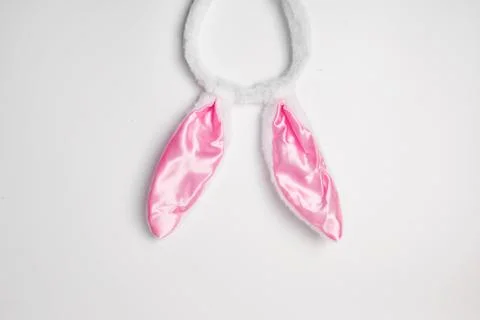 Top view of grey rabbit ears on white background easter minimal blogger conce Stock Photos