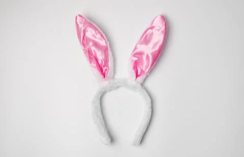 Top view of grey rabbit ears on white background easter minimal blogger conce Stock Photos