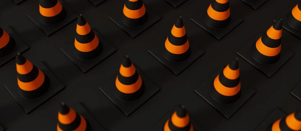 Top view on grid of Orange Traffic cone isolated on black background. Safety Stock Illustration