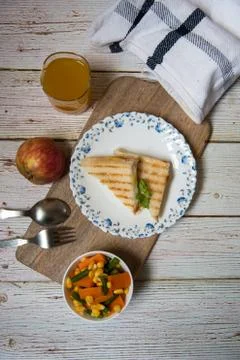 Top view of grilled bread sandwich in a white  plate Stock Photos
