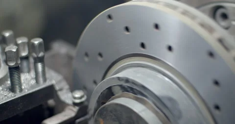 Top view grind the brake disc.The blade for grinding steel is cutting. Stock Footage 294568558