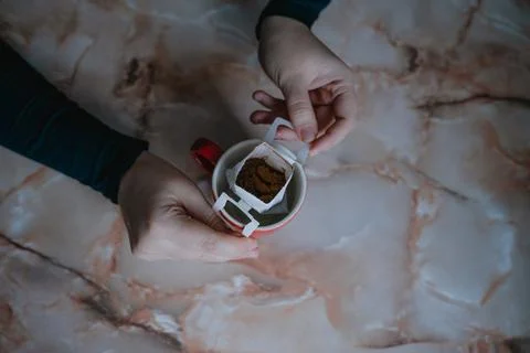 Top view of ground coffee in a filter bag Stock Photos