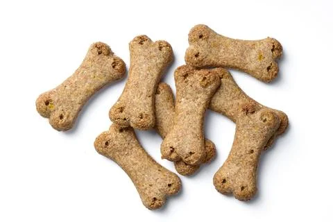 Top view of group of crunchy bone shaped dog biscuit set isolated on white .. Stock Photos