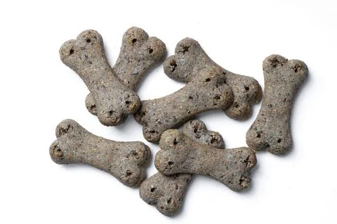 Top view of group of crunchy bone shaped dog biscuit set isolated on white .. Stock Photos