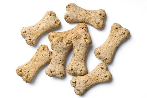 Top view of group of crunchy bone shaped dog biscuit set isolated on white .. Stock Photos