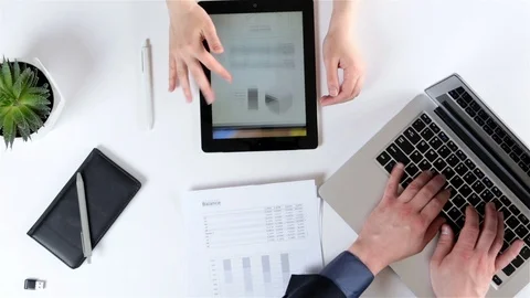 Top view of group of two business people, planning and discussing Stock Footage 93335782