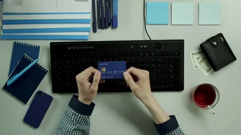 Top view of guy entering wrong credit card data Stock Footage 79987801