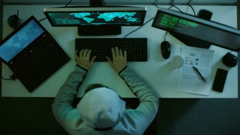 Top View of a Hacker Breaking into International Datacenter. He Uses Self Made  動画素材 72379710
