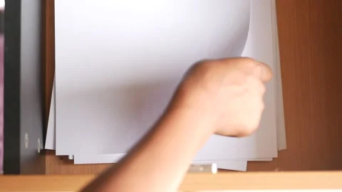 Top view hand pick white paper from a drawer Stock Footage 189347582