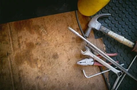 Top view hand tools on a dirt paper in rustic style,copy space Stock Photos