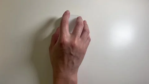 Top view hand using white mouse button on white office desk Stock Footage 278246657