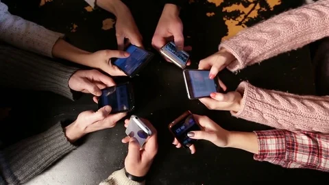 Top view hands circle using smart phones in cafe Stock Footage 72533316