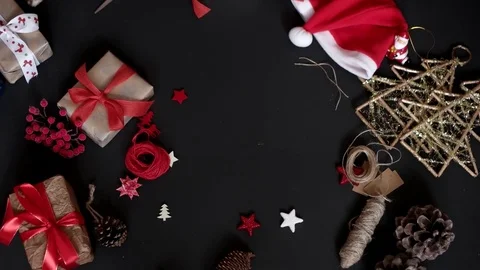 Top View Hands Holding Christmas Presents at Wooden Desk From Above Stock Footage 71795366