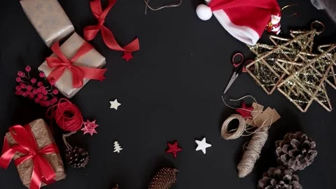 Top View Hands Holding Christmas Presents at Wooden Desk From Above Видео 71796540