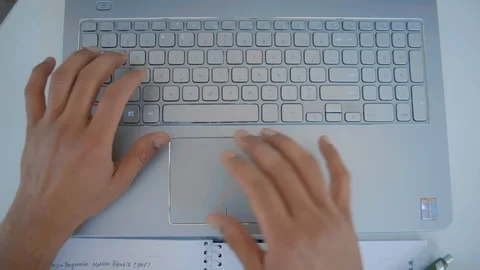 Top View, Hands of an Indian Student Type Text on Laptop Keyboard Stock Footage 107993875