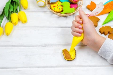 Top view of hands making gingerbread cookies for Easter Stock Photos