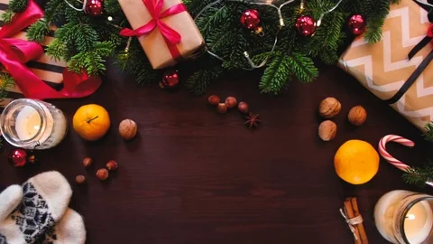Top view of hands of Santa Claus put the gift on the table. Stockbeeldmateriaal 70361920