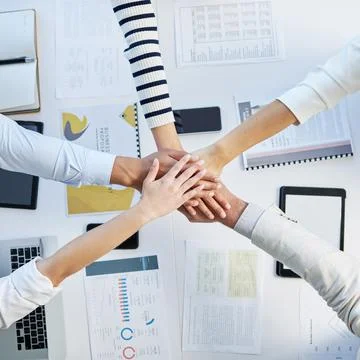 Top view, hands stack and table in office for motivation, team building and 스톡 사진