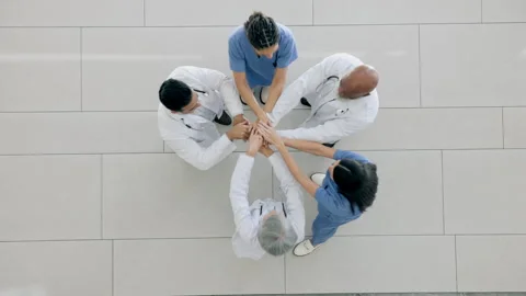 Top view, hands together and doctors wit... | Stock Video | Pond5