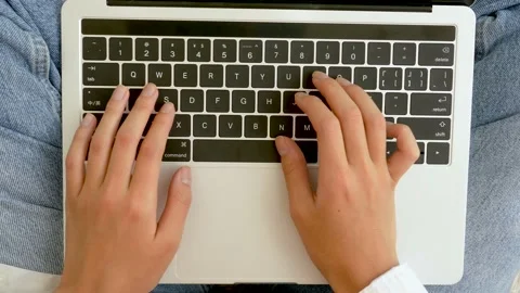 Top view of hands typing on laptop keyboard Stock Footage 162167607