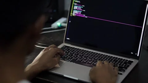 Top View of Hands Typing on Laptop Keyboard in Modern Office Workspace Stock Footage 340450454