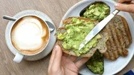 Top View Of Healthy Breakfast With Avocado Toast And Coffee In Cafe Stock Footage