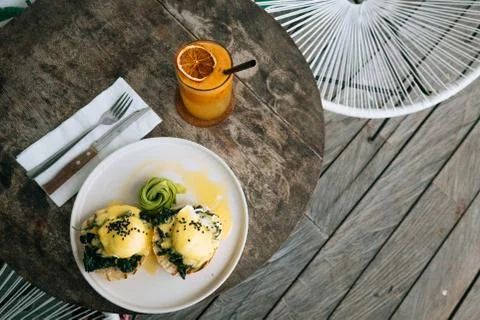 Top view of Healthy Breakfast with Bread Toast and Poached Egg with spinach Фото