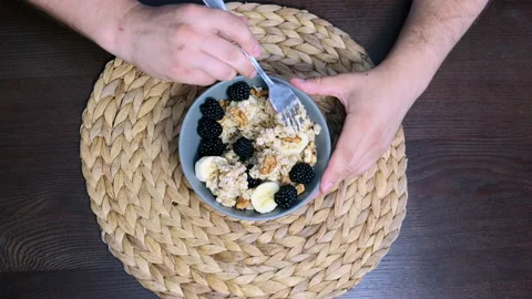 Top view. Healthy breakfast on the kitchen, bowl Stock Footage 202593283