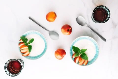 Top view of healthy breakfast of natural greek yoghurt, fruit and juice on Stock Photos