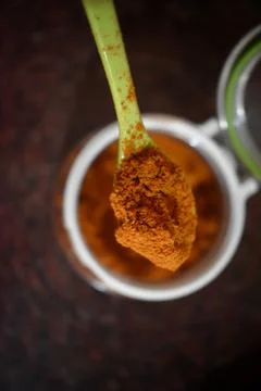 Top View of Heap of Red Chilli Pepper Powder in a Glass bowl isolated on whit Stock Photos