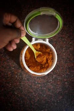 Top View of Heap of Red Chilli Pepper Powder in a Glass bowl isolated on whit Stock Photos