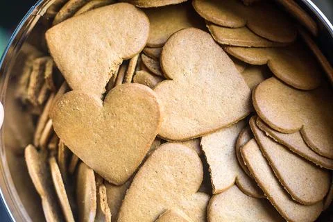 Top view to heart shaped ginger bread biscuits. Background or wallpaper in love Stock Photos