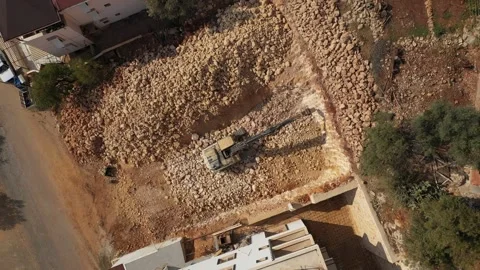 Top view of heavy tractor with jackhammer at construction site Vídeo Stock 280844842