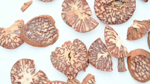 Top view herb BingLang or Arecae Semen or Betelnutpalm Seed rotating Stock Footage 163161461