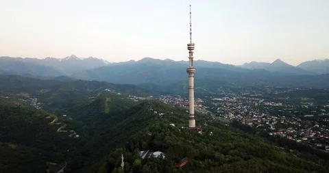 Top view of the high tower Kok Tobe. It offers a panorama of green mountains. Stock Footage 114887463