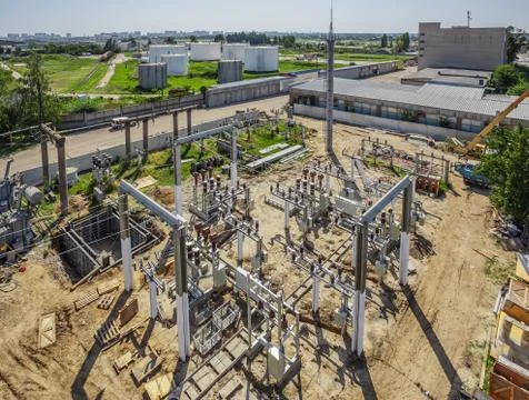 Top view of high-voltage substation with switches and disconnectors. Stock Photos
