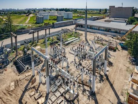 Top view of high-voltage substation with switches and disconnectors. Stock Photos