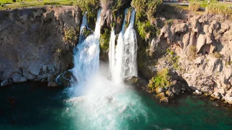Top view of a high waterfall falling into the mediterranean sea. Clean ecology Stock-Footage 142819170