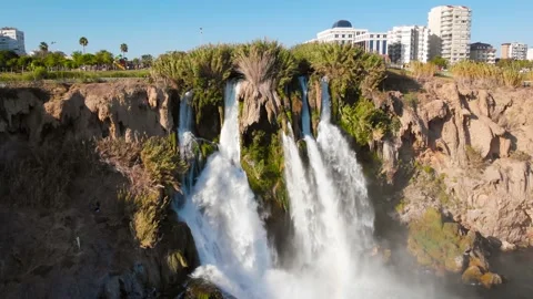 Top view of a high waterfall falling into the mediterranean sea. Clean ecology Stock-Footage 142819209