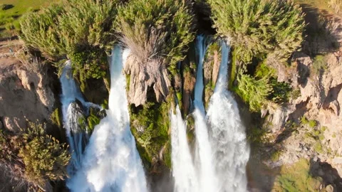 Top view of a high waterfall falling into the mediterranean sea. Clean ecology Stock-Footage 142819363