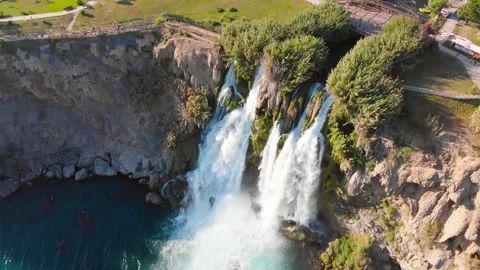 Top view of a high waterfall falling into the mediterranean sea. Clean ecology Stock-Footage 142819454