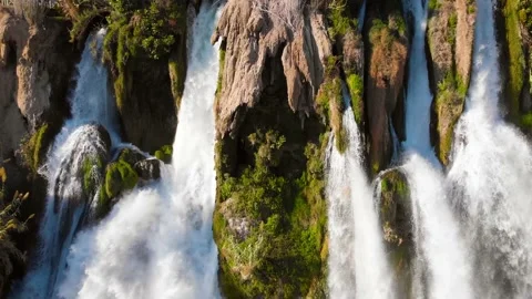 Top view of a high waterfall falling into the mediterranean sea. Clean ecology Stock-Footage 142819764