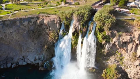 Top view of a high waterfall falling into the mediterranean sea. Clean ecology Stock-Footage 142819912