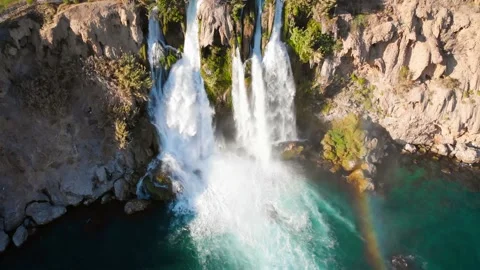 Top view of a high waterfall falling into the mediterranean sea. Clean ecology Stock-Footage 142820019